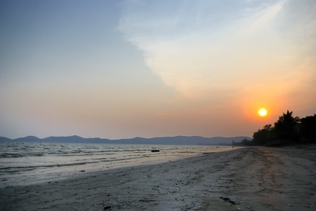 Silhouettes at the beachの写真素材