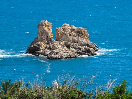 Turqouise sea in Sicily Italy with small islandの写真素材