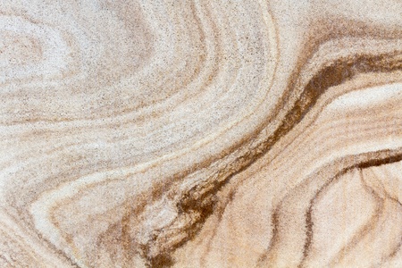 Brown stone with different line structures flat surface