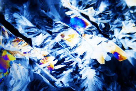 Microphoto: Microcrystals  of citric acid in polarized lightの写真素材