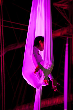 KIEL, GERMANY - JULY 18: Polish acrobat group "Ocelot" in the  rigging of sailing ship "Fryderyk Chopin" on the occasion of "Chopin / Polska / The Course" Tour in Kiel, July 18, 2010 in Kiel, Germanyのeditorial素材