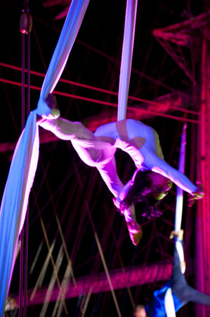 KIEL, GERMANY - JULY 18: Polish acrobat group Ocelot in the  rigging of sailing ship Fryderyk Chopin...