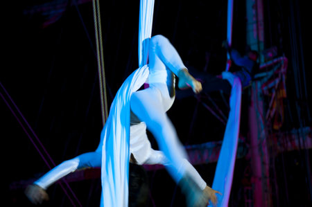 KIEL, GERMANY - JULY 18: Polish acrobat group "Ocelot" in the  rigging of sailing ship "Fryderyk Chopin" on the occasion of "Chopin / Polska / The Course" Tour in Kiel, July 18, 2010 in Kiel, Germanyのeditorial素材