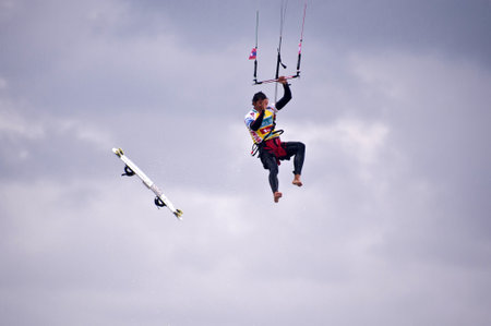 ST. PETER-ORDING, GERMANY - JULY 24: Professional kite-surfer Gunnar Biniasch, Germany, demonstrating his ability on the Palmolive Kitesurf Worldcup 2010 in St. Peter-Ording, July 24, 2010 in St. Peter-Ording, Germanyのeditorial素材