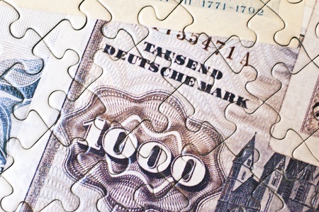 Close up of a money puzzleの写真素材