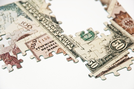 Puzzle of moneyの写真素材