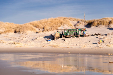 AMRUM, GERMANY - DECEMBER 29, 2014: On the Kniepsand Beach of  the North Frisian Island Amrum in Germany Land-Artists made Beach Huts and other Objects out of Flotsam and Jetsamのeditorial素材