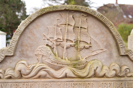 AMRUM, GERMANY - DECEMBER 31, 2014: In Nebel on the North Frisian Island Amrum in Germany the historic Sailor Tombstones have been restored. They are called speaking Grave Stonesのeditorial素材