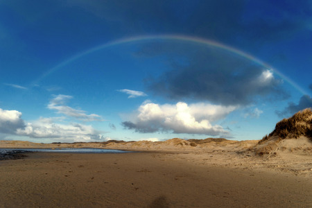 Rainbow on the North Frisian Island Amrum in Germanyの写真素材