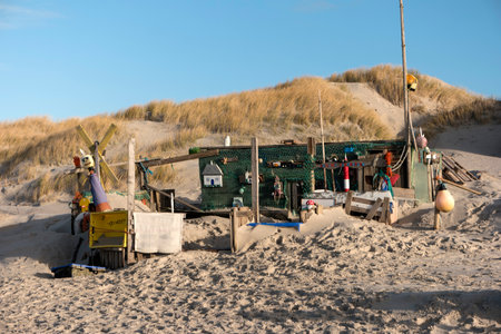 AMRUM, GERMANY - JANUARY 02, 2018: On the Kniepsand Beach of  the North Frisian Island Amrum in Germany Land-Artists made Beach Huts and other Objects out of Flotsam and Jetsamのeditorial素材