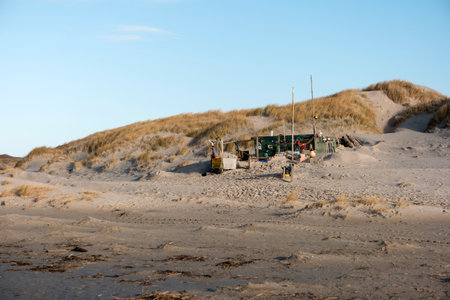 AMRUM, GERMANY - JANUARY 02, 2018: On the Kniepsand Beach of  the North Frisian Island Amrum in Germany Land-Artists made Beach Huts and other Objects out of Flotsam and Jetsamのeditorial素材