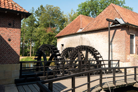 LANDGOED SINGRAVEN, NETHERLANDS - JULY 31, 2018: The Singraven estate is uniquely situated along the Dinkel near the village of Denekamp. On the estate there are many special listed buildings, among them the dignified house Singraven.のeditorial素材