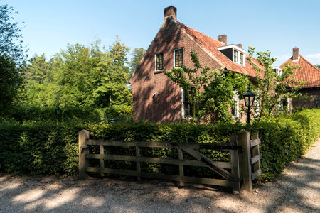LANDGOED SINGRAVEN, NETHERLANDS - JULY 31, 2018: The Singraven estate is uniquely situated along the Dinkel near the village of Denekamp. On the estate there are many special listed buildings, among them the dignified house Singraven.のeditorial素材