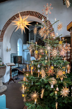 AMRUM, GERMANY - JANUARY 01, 2019: Christmas Tree in the Church of Nebel on the Island Amrum in Germanyのeditorial素材