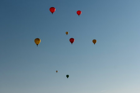 KIEL, GERMANY - JUNE 22, 2019: During the Kieler Woche 2019 Hot Air Balloons take off at the International Willer Balloon Sail.  Illustrative editorialのeditorial素材