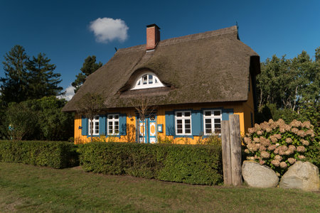 BORN ON DARSS, GERMANY - OCTOBER 06, 2021: The village is known for its picturesque colorful thatched roof houses with traditional motifs.のeditorial素材