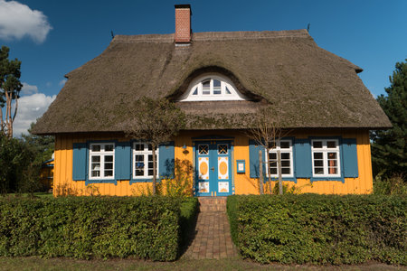 BORN ON DARSS, GERMANY - OCTOBER 06, 2021: The village is known for its picturesque colorful thatched roof houses with traditional motifs.のeditorial素材