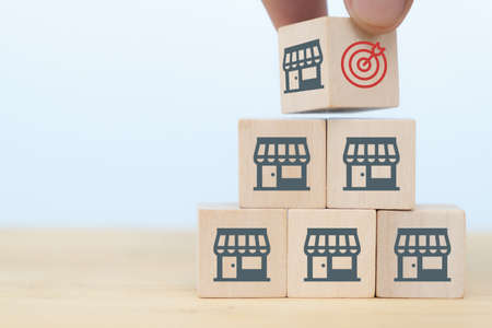 business in retail strategy growth concept. business hand man flip wooden cube for make business...