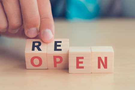 hand flip wooden block cube with text reopon. vintage styleの写真素材