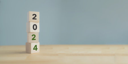 Starting new year 2024. 2024 on wooden cube blocks. Beginning and start of the new year 2024. Preparation for new year ,life, business, plan, goals, business target and strategy concept.の写真素材