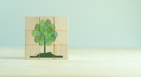Abstract tree with different fingerprints leaves isolated on wooden cube blocks on clear background. World environment day or earth day concept. World Forestry Day. Environment  protection concept.の写真素材