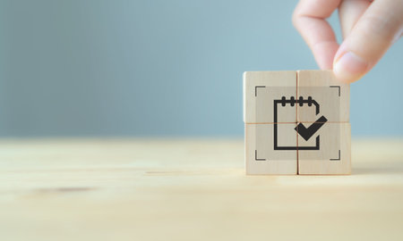 Effective time planning and management concept. Business or project or task planning. Daily plan. Timeline planning and management icon on wooden cube blocks on clear background and copy space.の写真素材