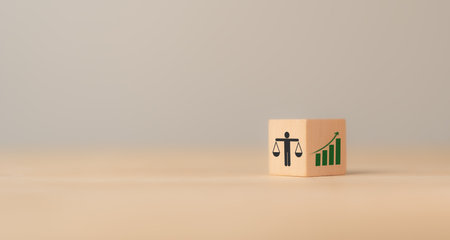 Business ethics, corporate growth and sustainability concept. Business ethics, environmental ethics, applied ethics, and . Wood  blocks with ethical and corporate growth icon.の写真素材
