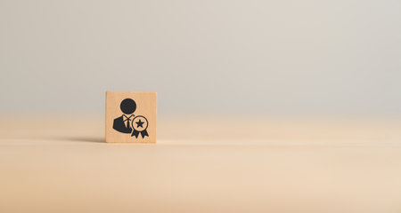 Personal development and career growth concept. Wooden cube blocks with career promotion icon and the concept of development icons. Learning, performance and competency development.の写真素材