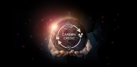 Carbon credit concept. Tradable certificate to drive industry and company in the direction of low emissions in efficiency cost. Green concept with carbon offsetting solution symbols.の写真素材