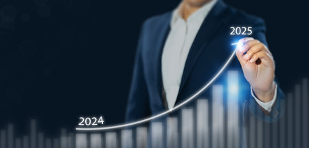 Business growth forecast in 2025. A businessman projects an upward trend line from 2024 to 2025 over...