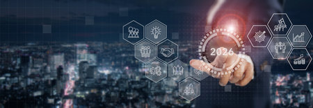 2026 new year business goals and strategic planning, challenge business target in 2026. Businessman interacts futuristic digital icons representing business strategies and growth. Corporate plan 2026.の写真素材