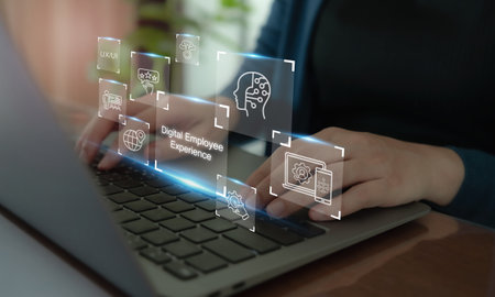 Digital Employee Experience concept.Hands typing on a laptop keyboard with futuristic digital interface such as digital employee experience,  digital tools, technologies and platforms in organization.の写真素材