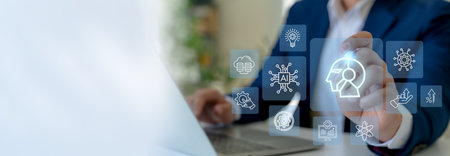 Human-AI collaboration concept. Businessman interface digital icon of a human-AI hybrid head, synergy between human intelligence and artificial intelligence  in modern technology and innovation.の写真素材