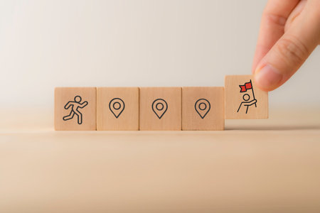 Career Path and Development Strategy Concept. Arranging wooden blocks with icons success roadmap and...