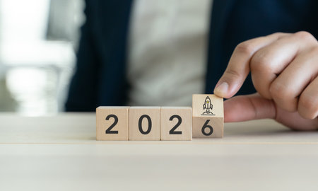 2026 Innovation and Product Launch concept. Wooden blocks forming 2026 with a rocket icon. Creative ideas, innovation, new product launch, future growth and business acceleration for 2026.の写真素材
