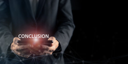 Conclusion Concept. A business professional holds a digital device displaying Conclusion, symbolizing final decisions, clear outcomes and the closing stage of strategic analysis and presentations.の写真素材