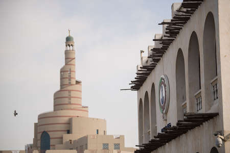 Traditional Arabian mosque with minarets in old market Waqif,Doha,Qatarのeditorial素材