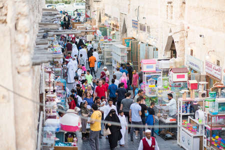 Doha,Qatar - March 05, 2019 : Street with pet shops within old market Souk Waqif.のeditorial素材