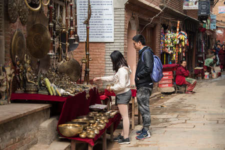 Kathmandu, Nepal- March 20,2022 : Tourists tour the Patan Durbar Square. Patan is one of the oldest know Buddhist City.のeditorial素材