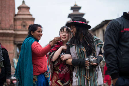 Kathmandu, Nepal- March 20,2022 : Tourists tour the Patan Durbar Square. Patan is one of the oldest know Buddhist City.のeditorial素材