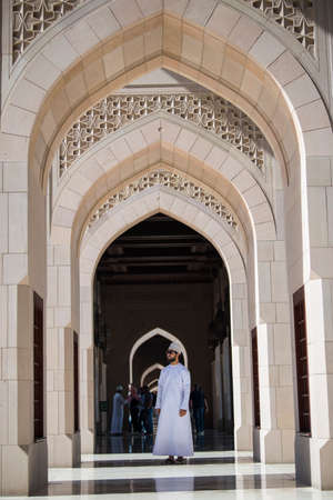 Muscat, Oman - March 05,2019 : Tourists tour in the Sultan Qaboos Grand Mosque.のeditorial素材
