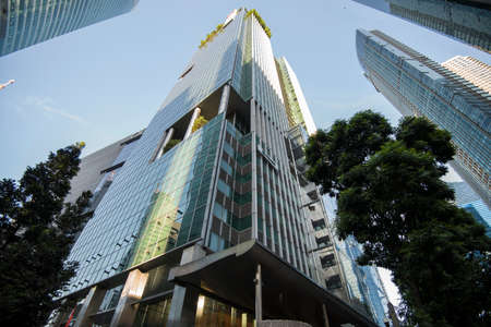 Singapore City,Singapore - September 08, 2019: Low wide-angle view looking up to modern skyscrapers...