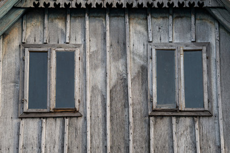 Sunja, Croatia, April 20,2021 : Rustic style aged window at rural home wall.の写真素材