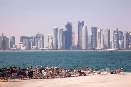 Doha,Qatar - March 05, 2020 : People enjoying a sunny day in the park of the Museum of Islamic Art...