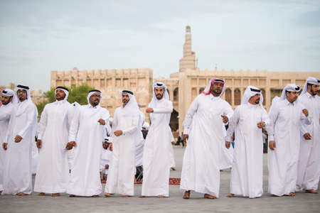 Doha,Qatar - March 05, 2019 :  The performance of traditional Qatari music and dance is performed by local people in old bazaar market Souk Waqif.のeditorial素材