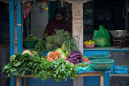 Kathmandu, Nepal- April 20,2019 : Vegetables trader on the street of Kathmandu.のeditorial素材