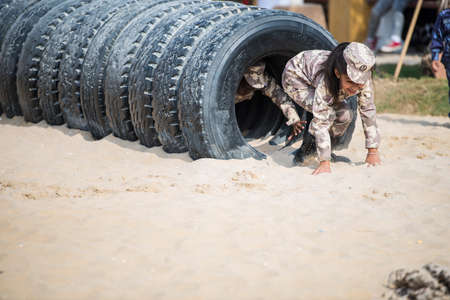 Doha, Qatar, December 18,2019. Qatari children are playing at an artificial condominium military training ground to celebrate Qatar national day.のeditorial素材