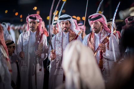 Doha,Qatar - December 18,2017. Traditional bedouin sword dancing for celebration Qatar national day.