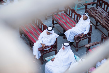 Doha,Qatar, April 15,,2022, Local people at auction of antiques on the passage of the old market market souk Waqif.のeditorial素材