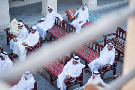 Doha,Qatar, April 15,,2022, Local people at auction of antiques on the passage of the old market market souk Waqif.のeditorial素材